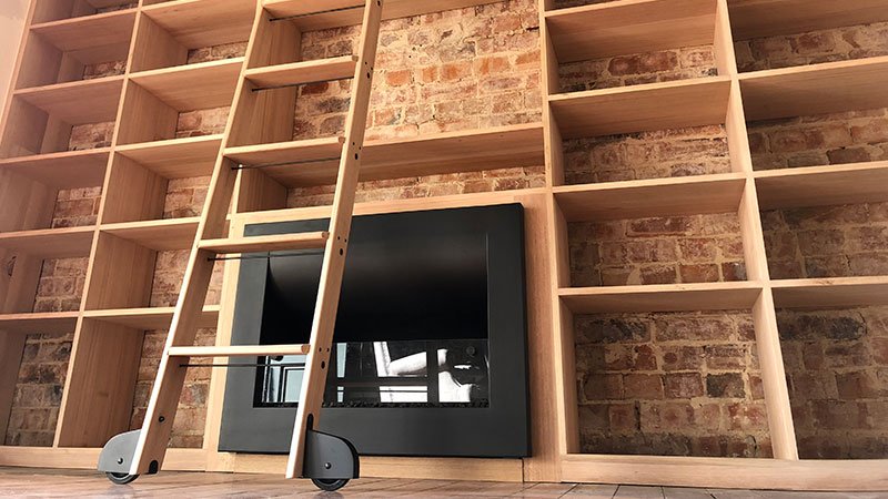 Bespoke sustainable Oak bookcase with library ladder